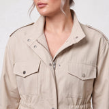 Long women's polyester trench coat with a belt for everyday wear.